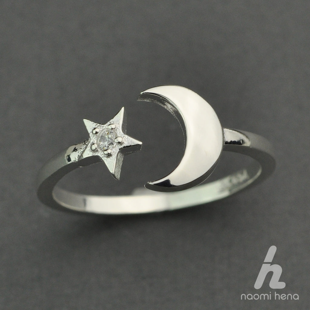 Paved moon and CZ star ring